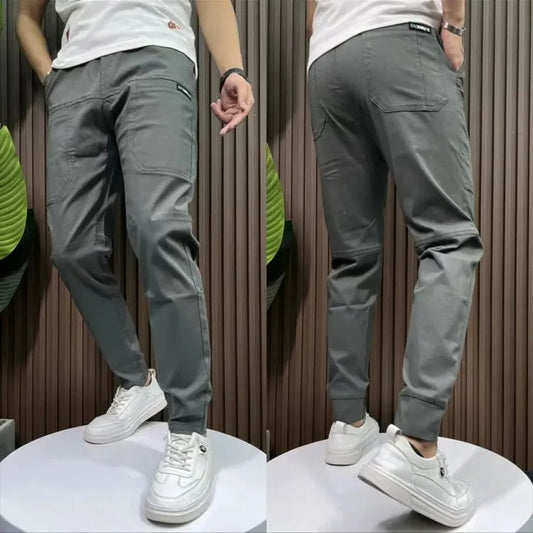 Pantaloni cargo skinny altamente elastici con tasche multiple da uomo👖