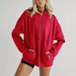 Top da donna con mezza zip e risvolto casual