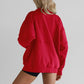 Top da donna con mezza zip e risvolto casual