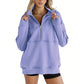 Top da donna con mezza zip e risvolto casual