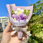 Incantevole mini bouquet di fiori lavorato a mano a maglia