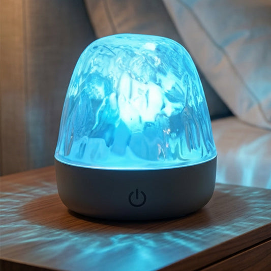 Lampada a LED a 16 colori con effetto increspatura dell'acqua e telecomando.