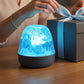 Lampada a LED a 16 colori con effetto increspatura dell'acqua e telecomando.