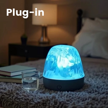 Lampada a LED a 16 colori con effetto increspatura dell'acqua e telecomando.